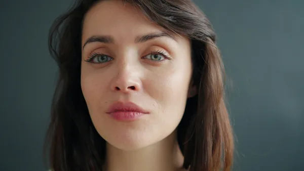 Woman with natural-looking, rested skin